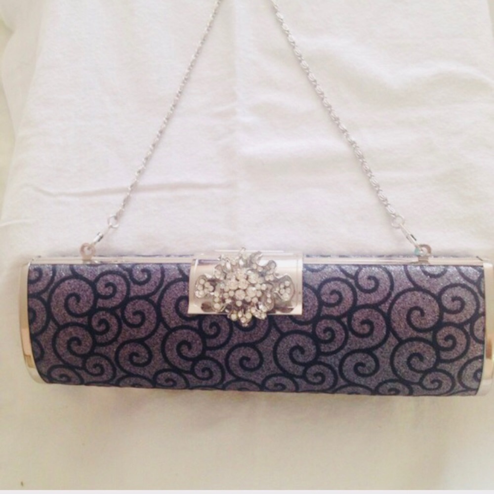 Beautiful Jeweled convertible clutch.